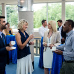 Cómo coordinar a diferentes proveedores en un evento 3 Cómo coordinar a diferentes proveedores en un evento - business executives interacting with each other wh 2025 04 04 14 05 21 utc