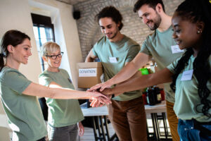 Home particulares - portrait of volunteers with working in community c 2026 01 08 00 11 42 utc